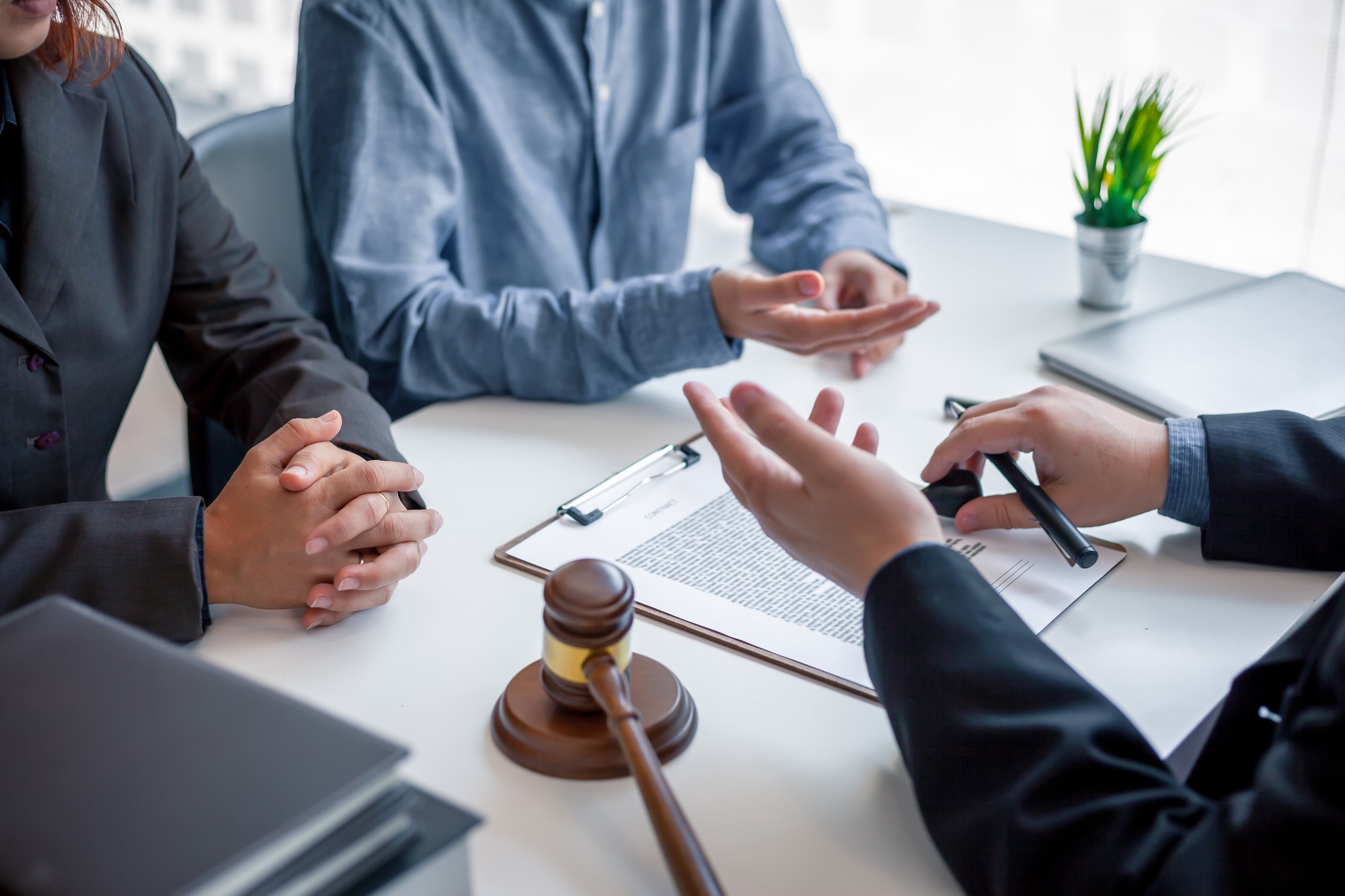 Businessman And Lawyer Discuss The Contract Document. Treaty Of The Law. Sign A Contract Business.